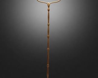 52
A Tiffany Studios Harp Floor Lamp
Circa 1902-1919; New York, NY
Shade signed: L.C.T. / Favrile; Base signed: Tiffany Studios / New York / 425
The green iridescent "Wave" Favrile glass shade with tones of blue and orange on a single-light, gilt-bronze, harp base with floriform stem raised on scrolled feet, electrified
Overall: 55" H x 12.5" Dia.; Shade: 10.25" Dia.
Estimate: $4,000 - $6,000