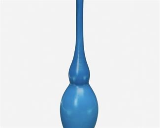 56
A Blue L.C. Tiffany Favrile Glass Bud Vase
1910; New York, NY
Signed: L.C. Tiffany Favrile / 1576 E
The opaque blue Favrile glass bud vase with gourd-shaped body and slender neck on a dark brown iridescent foot
12.5" H x 3" Dia.
Estimate: $1,000 - $1,500