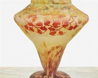 79
A Daum Vitrified Cameo Glass "Wild Rose Bud" Vase
First-quarter 20th Century; Nancy, France
Signed: Daum Nancy [Croix de Lorraine]
The vitrified and acid-etched cameo glass "Wild Rose Bud" wide-shouldered vase with tapered body and wide base cut from green and red to mottled brown and yellow frost
10.75" H x 9" Dia.
Estimate: $1,000 - $1,500