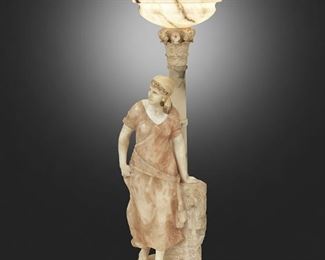85
A Greco-Roman-Style Carved Soft Stone Floor Lamp
First-half 20th Century
Incised: Made in Italy
The Greco-Roman-style carved soft stone floor lamp depicting a contrapposto standing woman in front of a figural fountain and Corinthian column surmounted by an illuminated globe with gadrooning and Greek key meander, electrified
Overall: 49" H x 14.5" W x 13.5" D
Estimate: $2,000 - $3,000