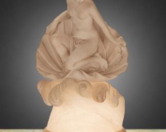 89
A Carved Alabaster Birth Of Venus Table Lamp
First-quarter 20th Century
Signed indistinctly to base
The carved alabaster table lamp depicting the goddess Venus emerging from a shell atop crashing waves, electrified
21" H x 11" W x 9.5" D
Estimate: $700 - $900