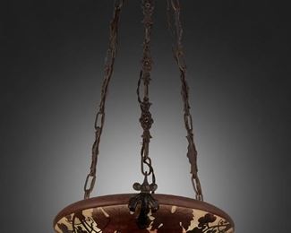 95
A Daum Cameo Glass "Grape And Vine" Pendant Chandelier
First-quarter 20th Century
Signed: Daum Nancy [Croix de Lorraine]
The acid-etched cameo glass domical shade with grape and vine motifs cut from purple to light green frost fitted with three light sockets and floral patterned wrought iron hardware and canopy, electrified
22" H x 12" Dia.
Estimate: $1,000 - $1,500