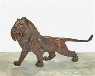 102
A Japanese Okimono Bronze Lion
Meiji period: 1868-1912
Chop mark to base: Takao
The bronze okimono in the form of a prowling lion with mouth agape and inset glass eyes
6" H x 11" W x 2.75" D
Estimate: $800 - $1,200