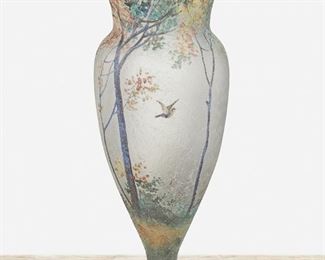 110
A Handel "Teroma" Glass Vase
First-quarter 20th Century; Meriden, Connecticut
Signed: Handel / Teroma / 4216
The baluster-form vase in chipped ice and sand-finished glass with obverse-painted enamel woodland scene with swallows in flight
11" H x 4.5" Dia.
Estimate: $700 - $900