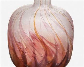 113
A Gallé Engraved Paperweight Glass Flacon
Late 19th/early 20th Century; Nancy, France
Signed: Galle
The paperweight glass bottle with red, pink, and amber swirl to clear with engraved swirl motif throughout
5.25" H x 4" Dia.
Estimate: $800 - $1,200