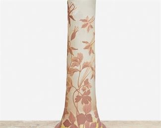 114
A Tall Gallé Cameo Glass "Columbine" Vase
Late 19th/early 20th Century; Nancy, France
Signed: Galle
The acid-etched cameo glass cylindrical "Columbine" vase with wide base and flared rim cut from mauve and pink to clear and yellow frost
24" H x 9" Dia.
Estimate: $1,000 - $1,500