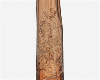 120
A Tall Gallé Smoked Glass "Lorraine Thistle" Vase
Late 19th/early 20th Century; Nancy, France
Etched signature to underside: Galle
The smoked glass vase with trefoil opening and tapered body decorated with enameled and engraved "Lorraine thistle" motif and gilt details
13.75" H x 3.75" Dia.
Estimate: $800 - $1,200