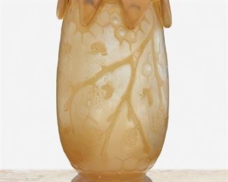 128
A Gallé "Honeycomb And Bees" Vase
Late 19th/early 20th Century; Nancy, France
Signed: Cristallerie a Emile Galle a Nancy
The footed vase with "Honeycomb and Bees" motif and stylized dripping honey to rim
6.5" H x 3.5" Dia.
Estimate: $1,000 - $1,500