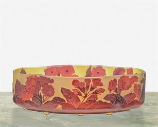 130
A Gallé Cameo Glass "Primrose" Bowl
Late 19th/early 20th Century; Nancy, France
Signed: Galle
The acid-etched cameo glass four-lobe shaped "Primrose" bowl cut from red to green frost
3" H x 10" W x 5.25" D
Estimate: $600 - $800