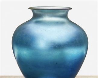 147
A Blue Steuben Aurene Glass Vase
Circa 1905-1933; Corning, New York
Signed: Steuben / Aurene / 2683
The blue Aurene glass vase, model no. 2683, with wide-shouldered body and flared neck
10.75" H x 10" Dia.
Estimate: $500 - $700