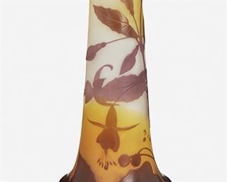 163
A Gallé Cameo Glass "Fuchsia" Vase
Late 19th/early 20th Century; Nancy, France
Signed: Galle
The acid-etched cameo glass cylindrical "Fuchsia" vase with wide base and flared rim cut from purple to yellow and white frost
9.5" H x 4.5" Dia.
Estimate: $600 - $800
