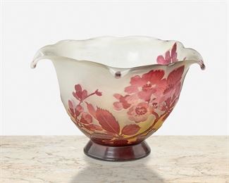 164
A Gallé Cameo Glass "Pommier Japonais" Bowl
Late 19th/early 20th Century; Nancy, France
Signed: Galle
The acid-etched cameo glass "Pommier Japonais" pentagonal bowl with five drop points and scalloped rim cut from red to pale yellow and white frost
4.5" H x 6.75" Dia.
Estimate: $400 - $600