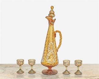 165
A Gallé Enamel Glass Apéritif Set
Fourth-quarter 19th Century; Nancy, France
Each signed: Galle a Nancy
Each amber glass with polychrome enamel overlay decoration, comprising a stoppered decanter with swirled glass body and twisted handle and four cordial glasses with twisted stems, 5 pieces
Larger: 15" H x 4.75" W x 4" D; Smaller: 2.75" H x 1.5" Dia.
Estimate: $600 - $800