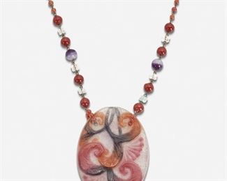 167
Gabriel Argy-Rousseau
1885-1953, French
Papyrus Floral Motif Art Glass Necklace In Pink And Raspberry Glass, Circa 1915
Pâte de verre
Initialed in glass to front: GAR
25" L x 2" W
Estimate: $500 - $700