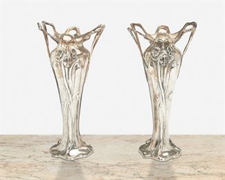 172
A Pair Of Jugendstil-Style English Pewter Vases
20th Century
Each marked: JJP-RMP; First further marked: 7; Second further marked: 84
By A.E. Williams, each vase with double handles and figural motif depicting a stylized female figure with flowers in her hair, 2 pieces
Each: 8.5" H x 4" Dia.
Estimate: $600 - $800
