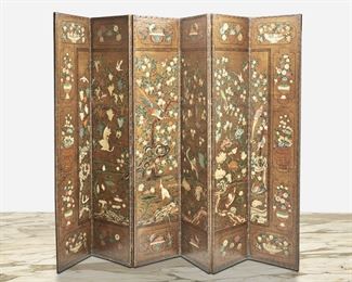 183
A Continental Hand-Painted Leather Folding Screen
Circa 1920s
Possibly Italian, the six-paneled room divider in hand-painted leather with Chinoiserie decoration depicting exotic birds, flowers, and grape vines surrounded by floral cartouches and finished with a nail stud trim
Each panel: 102" H x 22" W x 1.125" D; Overall: 102" H x 132" W x 1.125" D
Estimate: $1,000 - $1,500