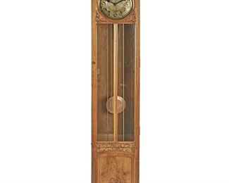 189
A Jugendstil Walnut Longcase Clock
Late 19th/early 20th Century; Germany
Movement signed: Mullko 21 / Harmonie Vollgong / P 100 1955331
With a silvered dial with black Arabic numerals through twelve, red Arabic numerals through twenty-four, black minute track, three weights, and pendulum in a carved walnut case with vine and berry motif and a glazed beveled glass door raised on bracket feet
91" H x 18.25" W x 11" D
Estimate: $1,000 - $1,500