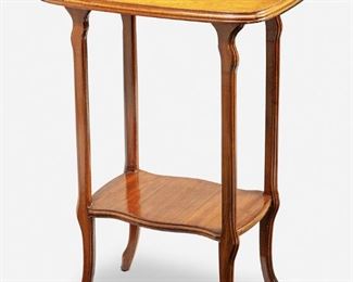 200
A Gallé Two-Tiered Marquetry Occasional Table
Circa 1885-1904; Nancy, France
Signed in marquetry: Galle
The two-tiered table with rectangular top with lily pad and dragonfly marquetry over a narrowing and shaped undershelf, raised overall on four carved legs with lightly flared feet
30" H x 24" W x 13" D
Estimate: $700 - $900