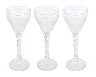 237
A Set Of Webb Corbett Cut Crystal Wine Goblets
Circa 1930-1947
Each signed: Webb Corbett / Made in England
Each wine goblet with cut foliate and floral motifs and frosted scrolling band raised on a twisted stem, 16 pieces
Each: 10" H x 3.75" Dia.
Estimate: $1,000 - $1,500