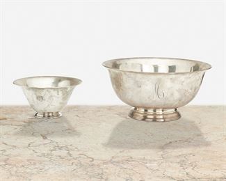 244
Two American Paul Revere-Style Sterling Silver Bowls
Circa 1925-1932
One marked: Tiffany & Co. / 20785 / Makers / 4070 / Sterling Silver / 925-1000 / M [John C. Moore II]; One marked: S. Kirk & Son, Inc. / Sterling / 221
Each Paul Revere-style bowl raised on pedestal foot with flared body and personalized, 2 pieces
Larger: 4.75" H x 9.5" Dia.; Smaller: 3" H x 6" Dia.
41.11 oz. troy approximately
Estimate: $500 - $700