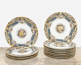 269
Twelve "Della Robia" Hand-Painted Porcelain Plates
1908-1909
Each dated and signed: EL
Each banded with Della Robia-style peacock and fruit swag motif on a gilt ground with matching central medallion, 12 pieces
Each: 1" H x 10.5" Dia.
Estimate: $600 - $800