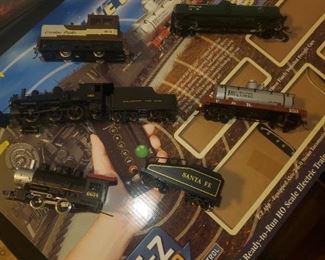Train set with multiple engines and cars