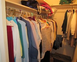 Several closets of clothes