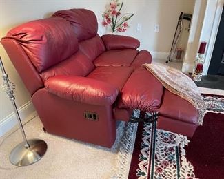 Leather reclining loveseat.