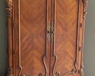 179. Carved Armoire (48" x 24" x 90")