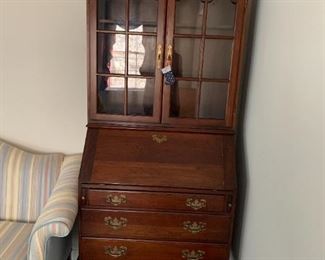 #6	Wood Drop-Front Secretary w/3 drawers & 2 glass doors w/2 shelves  30x17-28x71   (has cubbies inside the drop front)	 $175.00 
