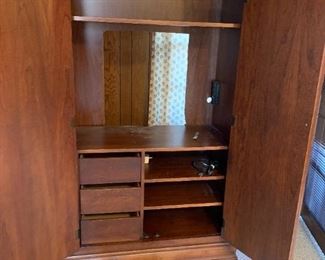#21	Entertainment  Center w/2 full doors (could be wardrobe) hole for  42" w/3 drawers & 2 shelves 39.5x20x76	 $125.00 
