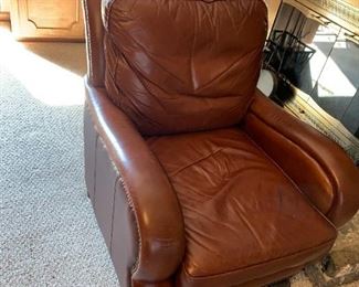 #24	Brown Leather Club Chair on Wheels w/nailhead trim (as is Seat & Side) 	 $125.00 
