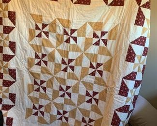 #57	Reversible pinwheel Burgandy/Cream - machine quilted	 $65.00 
