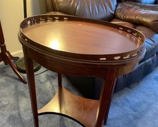 #107	Wood Oval End Table w/Shelf 22x16x28	 $100.00 
