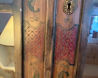 #109	Carved & Hand-Painted Asian Trouvailles Furniture w/2 doors & 2 Glass Doors w/3 glass Shelves 39x22.5x32-8' Tall w/pull-out shelves	 $800.00 
