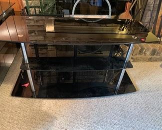 #167	Black Glass TV Stand w/3 shelves 42x18x21"	 $20.00 
