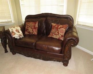 $260.00, Leather loveseat Vg condition, 70 w by 38" deep