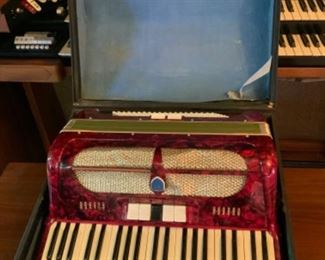Vintage Red Accordion in Original Case -has the word Voss on it