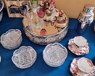 Hummels, Cut crystal bowls, Crystal Knife Rest, Antique Teacups & Saucers, Cocktail Shaker, Multi-colored crystal apertifs, Mirrored Plateau