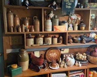 In kitchen. Above is McCoy pottery dated between 1912-1918 in green  in the "Ave. Of Tree pattern" Old ink pottery jars, antique ink pottery vessels, old pottery jugs.
