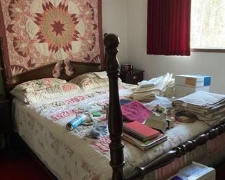 Many quilts, linens 4-poster bed with mattress.as new condition.
