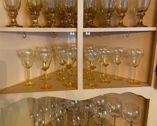 Many different wines and champagnes, water glasses above.