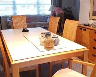 Item #3: $400. Stanley brand table with 6 cain back chairs. Smoky glass mirror top. With custom table pads to fit. Good condition. Chairs are clean! Shown here with over head lighting on. 44 L" x  80.5 W"