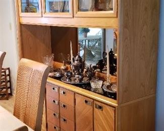 Item #2: $400. Stanley brand hutch. Back mirrored and smoky glass mirror top. Good condition. No interior lighting. Lots of storage. 64 L" x 80.5 H" x 17.5 D"