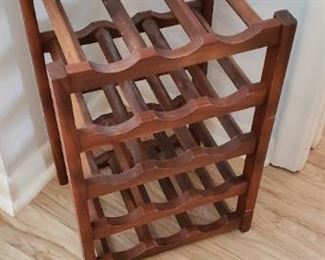 Item #9: $40. Wine rack made of wood. Some wear from use.  13 L" x 19.5 H" x 11 D"
