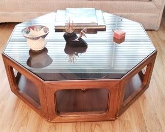 Item #24: $200.  Octagonal, retro glass and wood coffee table.  39" diameter x 14.5 H"