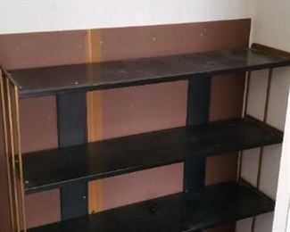 Item #62: $60. Vintage metal shelf unit. Some wear from use on the shelf edge paint. 36 L" x 34 H" x 9.5 D"