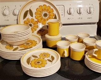 Item #26: $75.  Vintage Mikasa china set for 6. Some chips mostly on underside etc. See photos. None on cups, platter or cream/sugar