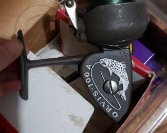 Item #79: $50. Orvis spin reel in box. Spins freely.