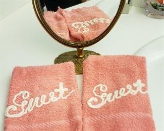 Item #73 and #74: 2 pc set of "guest" embroidered fingertip towels and vintage gilded tilt  mirror.                                        Towels, $8   Mirror, $12                      